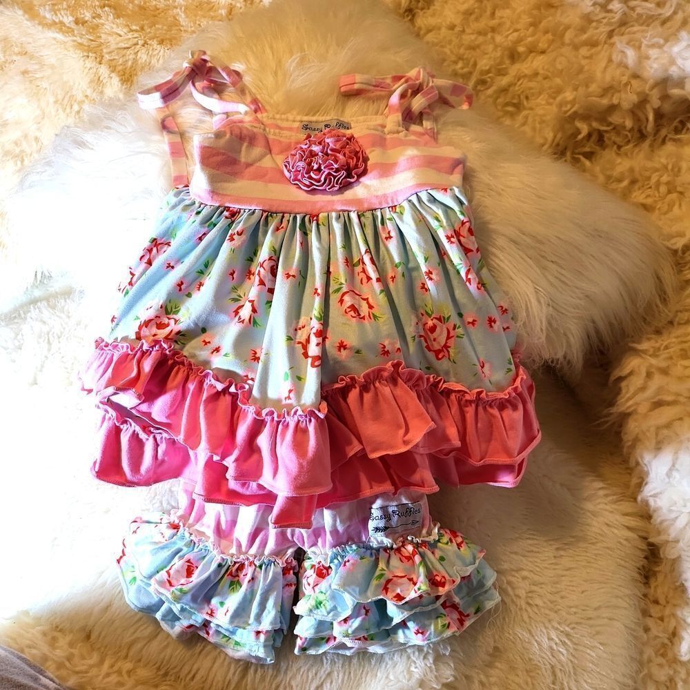 Sassy ruffles 2 piece outfit in excellent condition ,size9 months